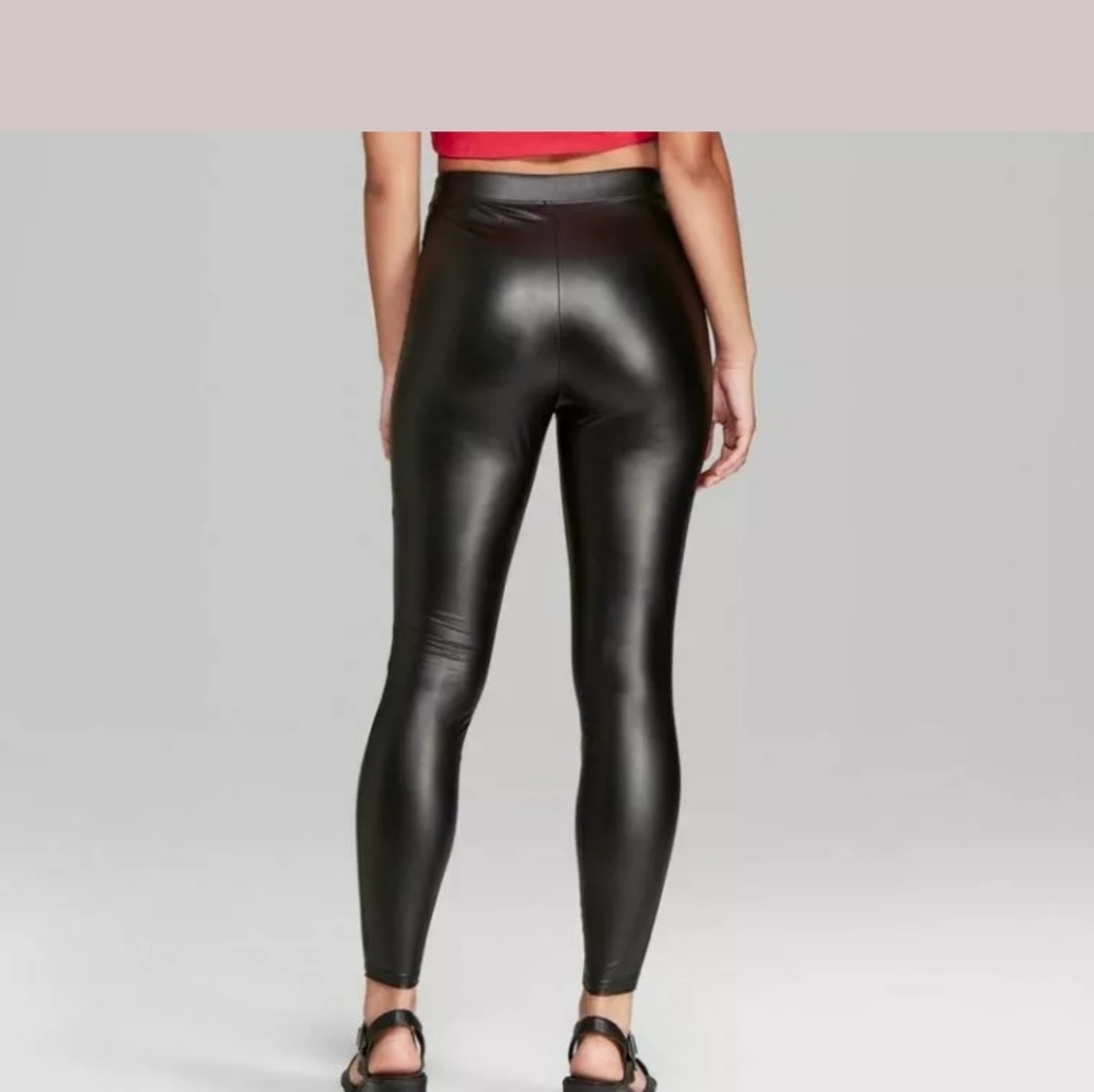 Black faux leather skinny pants